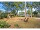 Spacious backyard with firepit and playset at 302 Lafayette Dr., Myrtle Beach, SC 29572