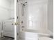 Bright bathroom features a tub shower combo, toilet and vanity with storage at 321 Seabert Rd. # 321, Myrtle Beach, SC 29579