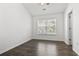 Bright bedroom with window, ceiling fan and wood flooring at 321 Seabert Rd. # 321, Myrtle Beach, SC 29579