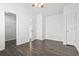 Well-lit bedroom with ample closet space and wood floor at 321 Seabert Rd. # 321, Myrtle Beach, SC 29579