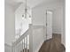 Upstairs hallway with neutral walls and wood flooring at 321 Seabert Rd. # 321, Myrtle Beach, SC 29579