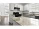 Spacious kitchen featuring granite countertops and a breakfast bar at 321 Seabert Rd. # 321, Myrtle Beach, SC 29579