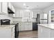 Modern kitchen with granite countertops and stainless steel appliances at 321 Seabert Rd. # 321, Myrtle Beach, SC 29579