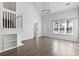Living room with hardwood floors, loft, and a view to the front yard at 321 Seabert Rd. # 321, Myrtle Beach, SC 29579