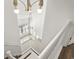 Elegant staircase overlooks a light-filled living area at 321 Seabert Rd. # 321, Myrtle Beach, SC 29579