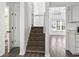 Staircase leading to the second floor with brown carpeting at 321 Seabert Rd. # 321, Myrtle Beach, SC 29579