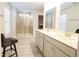Bathroom with double vanity, large mirror, and walk-in shower at 3339 Moss Bridge Ln., Myrtle Beach, SC 29579