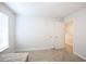 Simple bedroom with carpet, window, and door to hallway at 3339 Moss Bridge Ln., Myrtle Beach, SC 29579