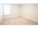 Empty bedroom with neutral carpet and a window with blinds at 3339 Moss Bridge Ln., Myrtle Beach, SC 29579