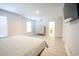 Main bedroom with dresser and access to en-suite bathroom at 3339 Moss Bridge Ln., Myrtle Beach, SC 29579