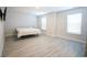 Bright bedroom with large windows and hardwood floors at 3339 Moss Bridge Ln., Myrtle Beach, SC 29579