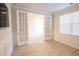 Spacious home office with double French doors and wood-look floors at 3339 Moss Bridge Ln., Myrtle Beach, SC 29579