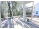 Screened porch overlooks backyard patio and wooded area at 3339 Moss Bridge Ln., Myrtle Beach, SC 29579