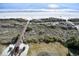 Aerial view of beach access and sandy shoreline at 3601 S Ocean Blvd. # 7-E, North Myrtle Beach, SC 29582