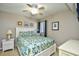 Bedroom with queen bed and ceiling fan at 3601 S Ocean Blvd. # 7-E, North Myrtle Beach, SC 29582