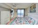 King bedroom with ocean view and ceiling fan at 3601 S Ocean Blvd. # 7-E, North Myrtle Beach, SC 29582