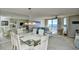 Bright dining area with ocean view and glass table at 3601 S Ocean Blvd. # 7-E, North Myrtle Beach, SC 29582