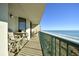Balcony with ocean view and outdoor seating at 3601 S Ocean Blvd. # 7-E, North Myrtle Beach, SC 29582