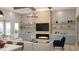 Bright living room featuring a fireplace, built-in shelving, and comfortable seating at 364 Ridge Dr., Galivants Ferry, SC 29544
