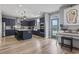 Modern kitchen with island, stainless steel appliances, and white quartz countertops at 375 Bumble Circle, Murrells Inlet, SC 29576