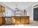 Kitchen with an island, stainless steel appliances, and hardwood floors at 3923 Gladiola Ct. # 301, Myrtle Beach, SC 29588