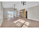 Living room with hardwood floors, a ceiling fan, and sliding glass doors at 3923 Gladiola Ct. # 301, Myrtle Beach, SC 29588