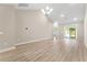 Living room with hardwood floors and access to patio at 4065 Taranto Loop # 4101-A, Myrtle Beach, SC 29579