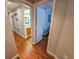 Hallway offers views to the bathroom and bedroom at 410 Melrose Pl. # 219, Myrtle Beach, SC 29572