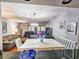 Bright and spacious living room featuring an open layout into the kitchen and dining area at 410 Melrose Pl. # 219, Myrtle Beach, SC 29572