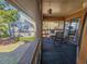Relaxing screened patio with views of lush greenery and a charming neighborhood at 410 Melrose Pl. # 219, Myrtle Beach, SC 29572
