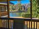 View from the screened patio overlooks the picturesque lake with a manicured landscape at 410 Melrose Pl. # 219, Myrtle Beach, SC 29572