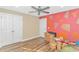 Bright bedroom with wood floors, double doors and an accent wall at 4106 Edwards Rd., Aynor, SC 29511