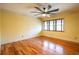 Spacious bedroom featuring hardwood floors and a large window at 429 Ocean Pointe Ct., North Myrtle Beach, SC 29582