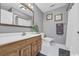 Bathroom with wood vanity and tiled floor at 5101 Wesley Rd., Murrells Inlet, SC 29576