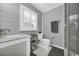 Bathroom with walk-in shower and modern vanity at 5101 Wesley Rd., Murrells Inlet, SC 29576