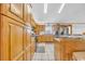 Spacious kitchen with ample wood cabinets at 5101 Wesley Rd., Murrells Inlet, SC 29576