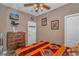 Bedroom with dresser, bed, and southwestern decor at 6001-1810 S Kings Hwy., Myrtle Beach, SC 29575