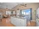 Open kitchen with island and breakfast bar, overlooking living area at 6001-1810 S Kings Hwy., Myrtle Beach, SC 29575