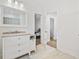 Bright bathroom showcasing a vanity with marble countertops and access to a bedroom at 640 Fox Hollow Rd., Murrells Inlet, SC 29576