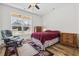 Cozy bedroom with hardwood floors and large window at 640 Fox Hollow Rd., Murrells Inlet, SC 29576