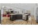 Open concept kitchen featuring a large island, granite counters, and stainless steel appliances at 640 Fox Hollow Rd., Murrells Inlet, SC 29576