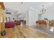 Spacious open-concept living room with hardwood floors, dining area and a seamless flow for entertaining at 640 Fox Hollow Rd., Murrells Inlet, SC 29576
