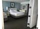 Cozy bedroom with white furnishings and natural light at 7100 N Ocean Blvd. # 1608, Myrtle Beach, SC 29572