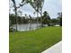Landscaped backyard with pond and bridge at 101 Green Lake Dr., Myrtle Beach, SC 29572