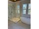 Spa-like bathroom with a walk-in shower and a freestanding bathtub at 101 Green Lake Dr., Myrtle Beach, SC 29572