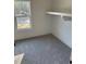 Bright bedroom with window and wall shelving at 101 Green Lake Dr., Myrtle Beach, SC 29572
