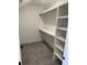 Bright walk-in closet with shelving and hanging rod at 101 Green Lake Dr., Myrtle Beach, SC 29572