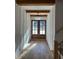 Grand entryway with hardwood floors, double doors, and wood beams at 101 Green Lake Dr., Myrtle Beach, SC 29572