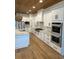 Spacious kitchen featuring stainless steel appliances and hardwood floors at 101 Green Lake Dr., Myrtle Beach, SC 29572