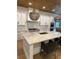 Modern kitchen with white cabinets, granite countertops, and a large island at 101 Green Lake Dr., Myrtle Beach, SC 29572